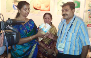 Dr. Shobha Raul, Ex  Mayor of Mumbai  appreciating the orange peel candy.