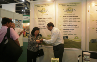 Mr Limbasiya showing products to buyer at Exhibition  at Kuala Lumpur (Malaysia)